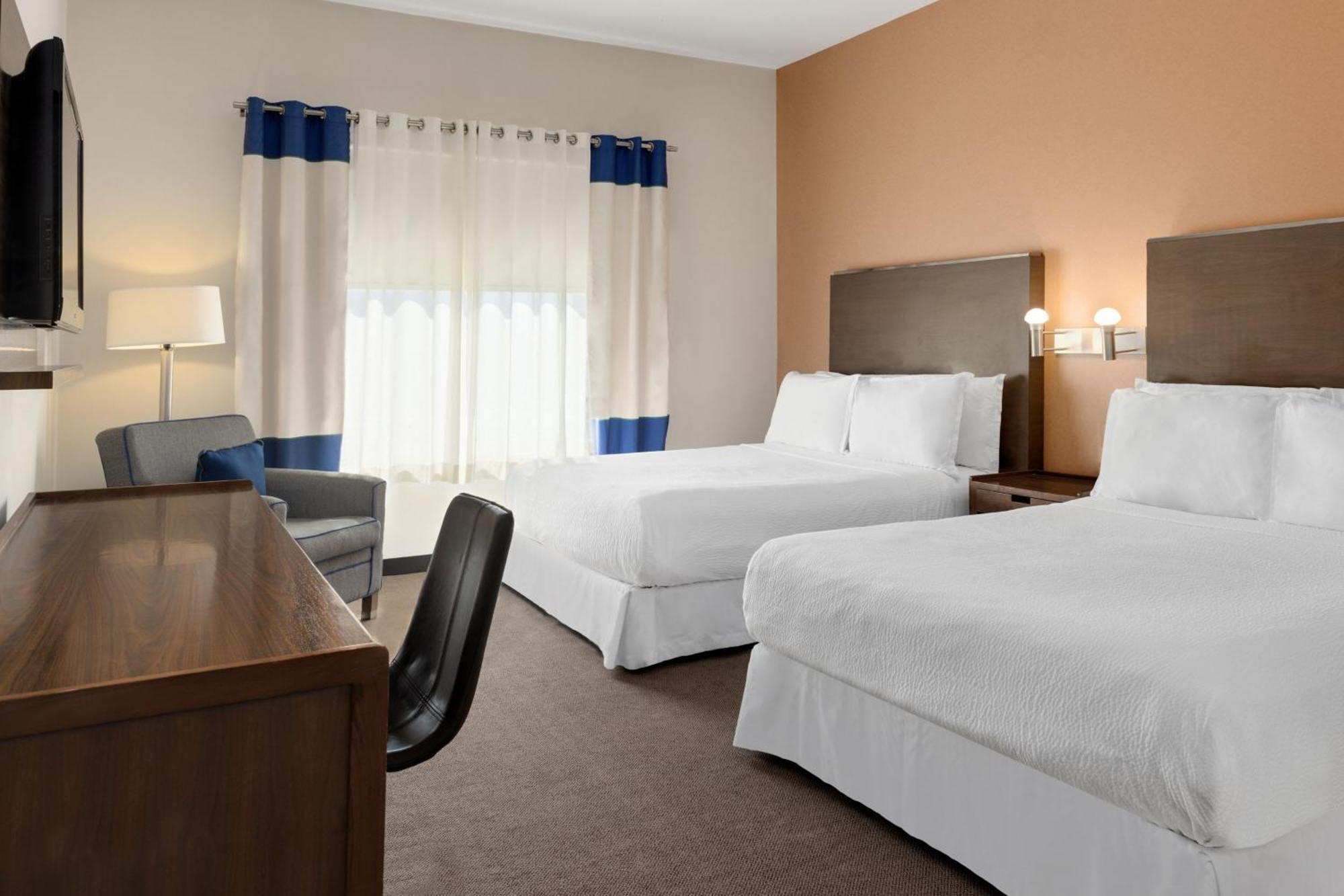 フォー ポインツ バイ シェラトン ギャレリア モンテレイ モンテレー エクステリア 写真 A typical guest room at an extended stay hotel